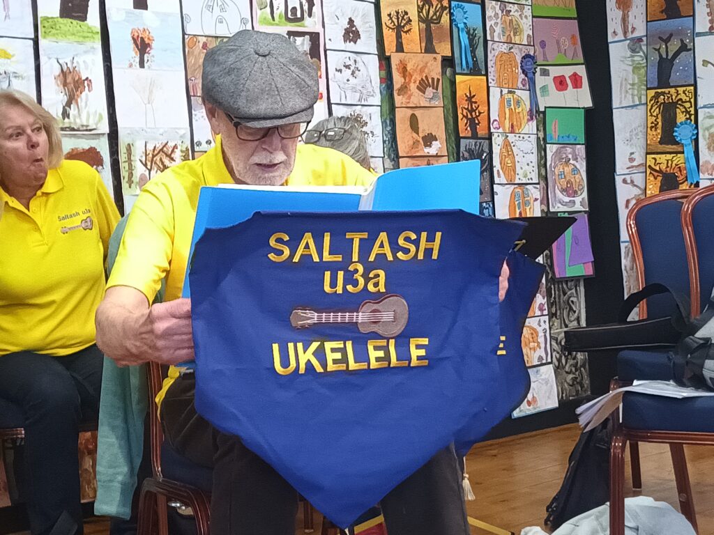 Ukelele band Saltash U3A at Callington Honey Fair on the Town Hall stage